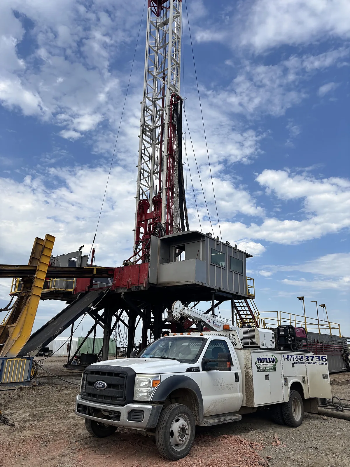 Mondak Equipment field service truck at a jobsite
